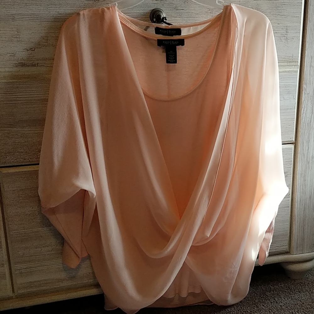 Pink 3/4 sleeve silk top.
